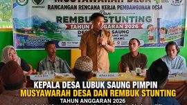 Kepala Desa Lubuk Saung memimpin Musyawarah Desa dan Rembuk Stunting Tahun Anggaran 2026 bersama BPD, Dinas PMD, Babinsa, Bhabinkamtibmas, pendamping desa, kader kesehatan, dan masyarakat di Balai Desa Lubuk Saung.